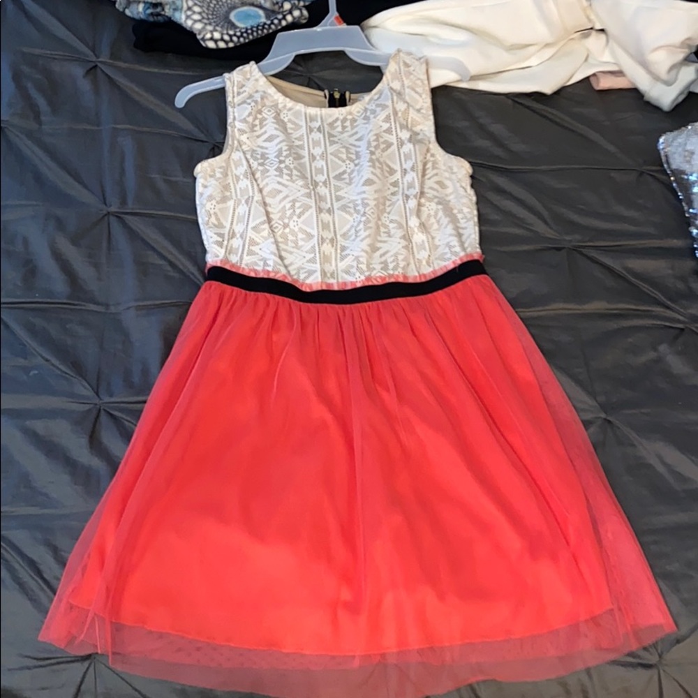 tan and coral colored dress